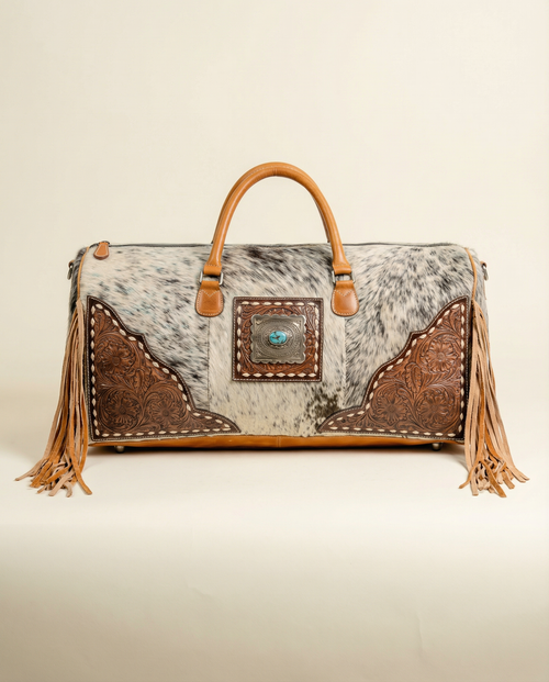 Hair-on leather duffle bag Western flair gemstone detail by Ya Qalbi