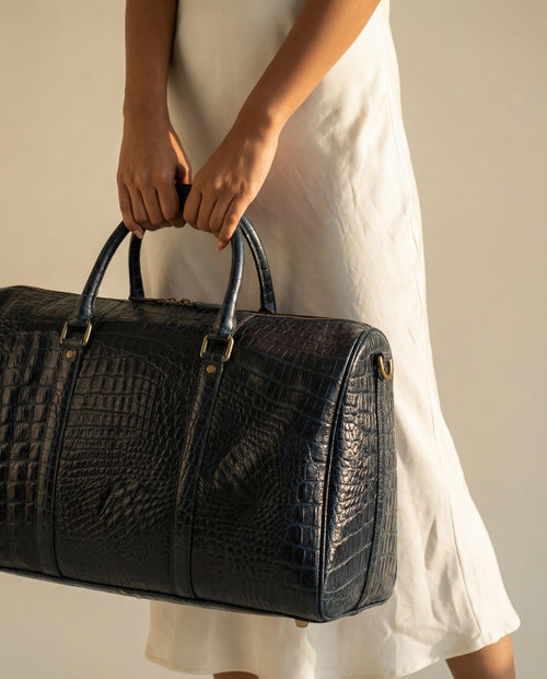 Blue crocodile texture leather weekender bag by Ya Qalbi