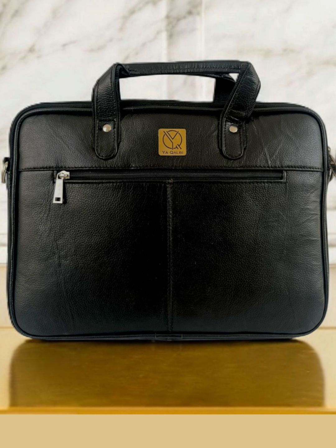 Black leather laptop bag, front view
