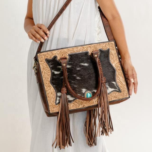 Western leather tote with sunflower carving styled by Ya Qalbi