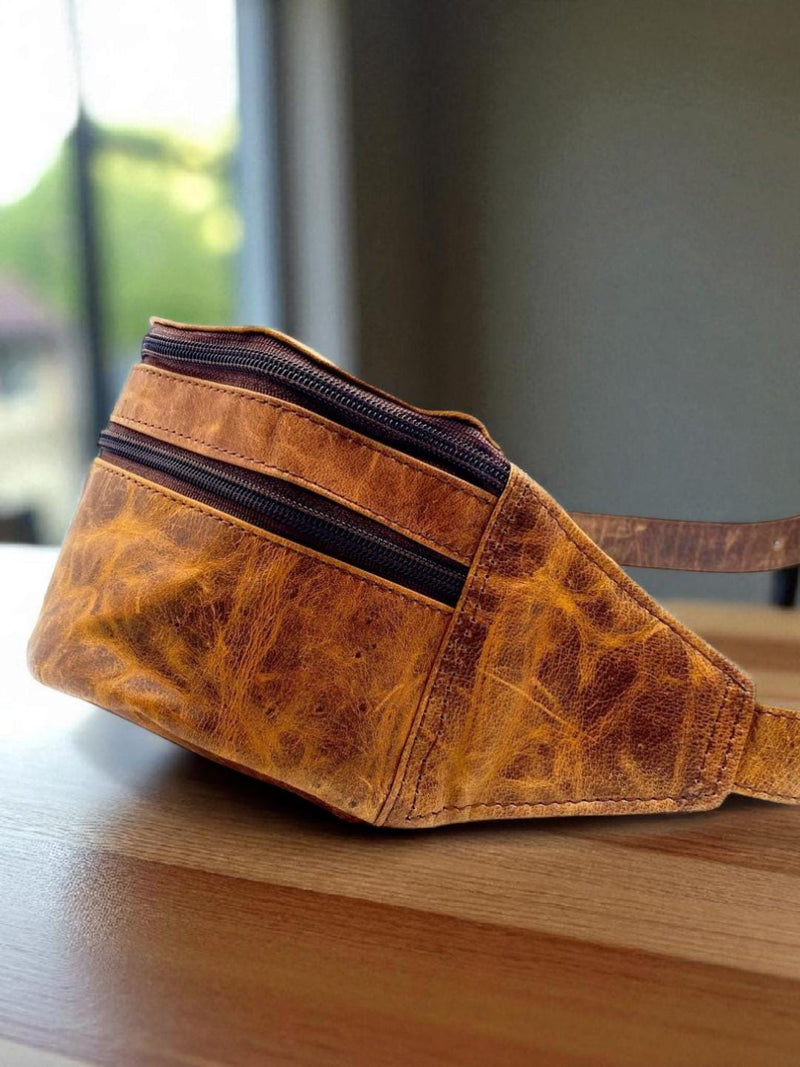 Crunch-textured leather waist bag by Ya Qalbi