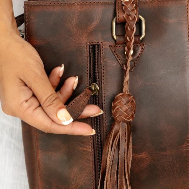 Artisan cowgirlcore leather tote fringe detail by Ya Qalbi