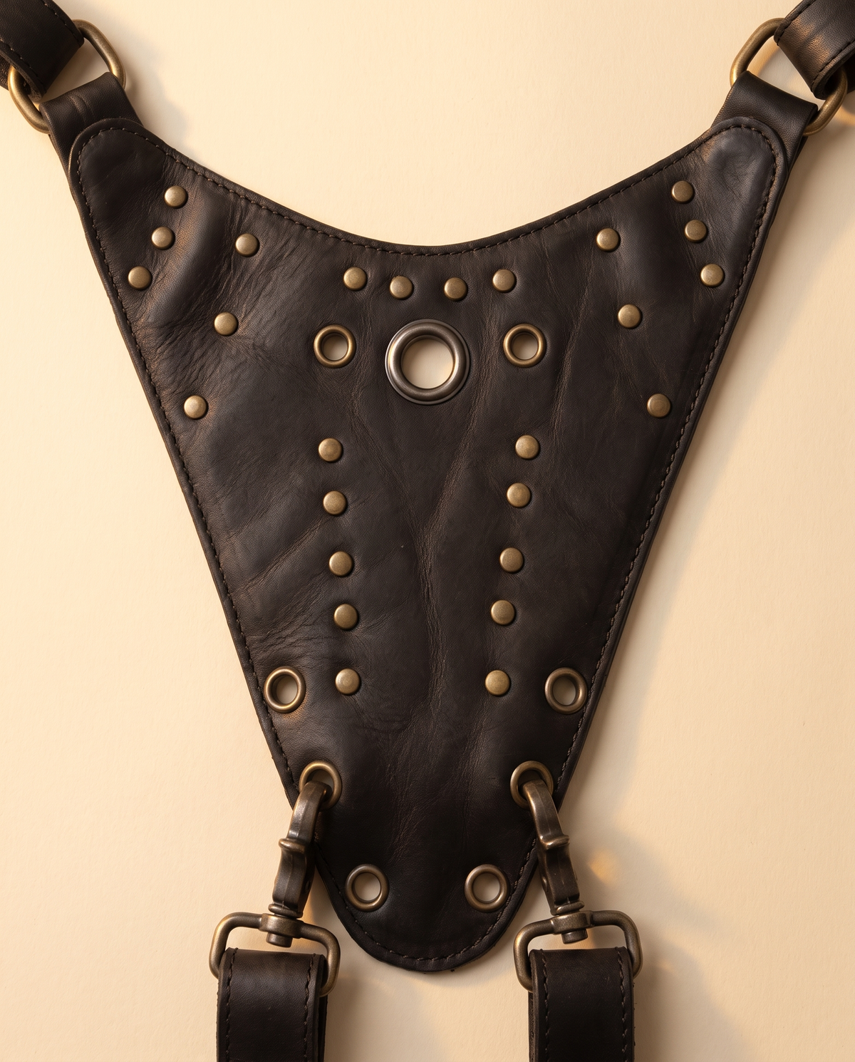 Black leather harness bag with two detachable pouches, by Ya Qalbi