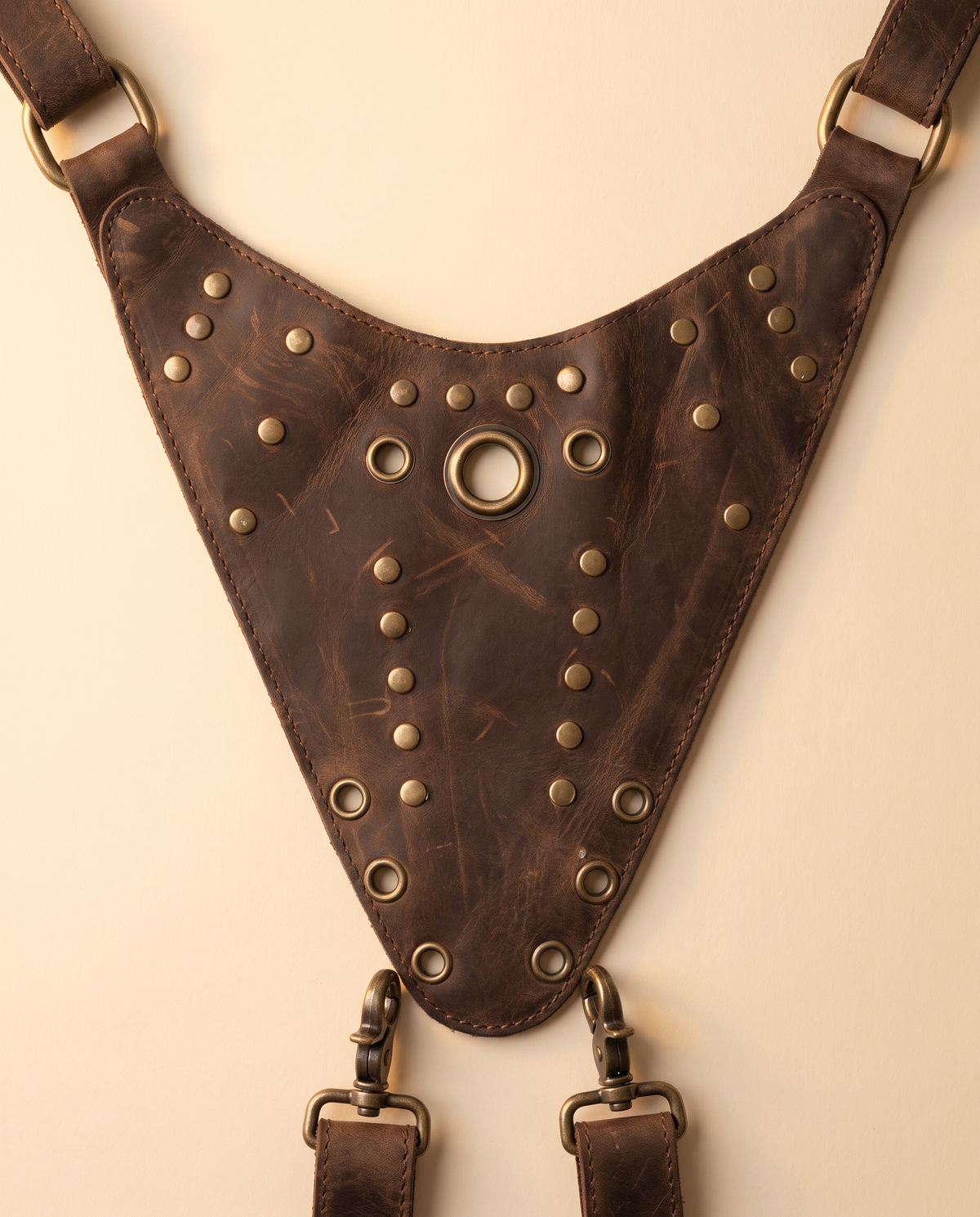 Dark brown leather harness bag with two detachable pouches, by Ya Qalbi