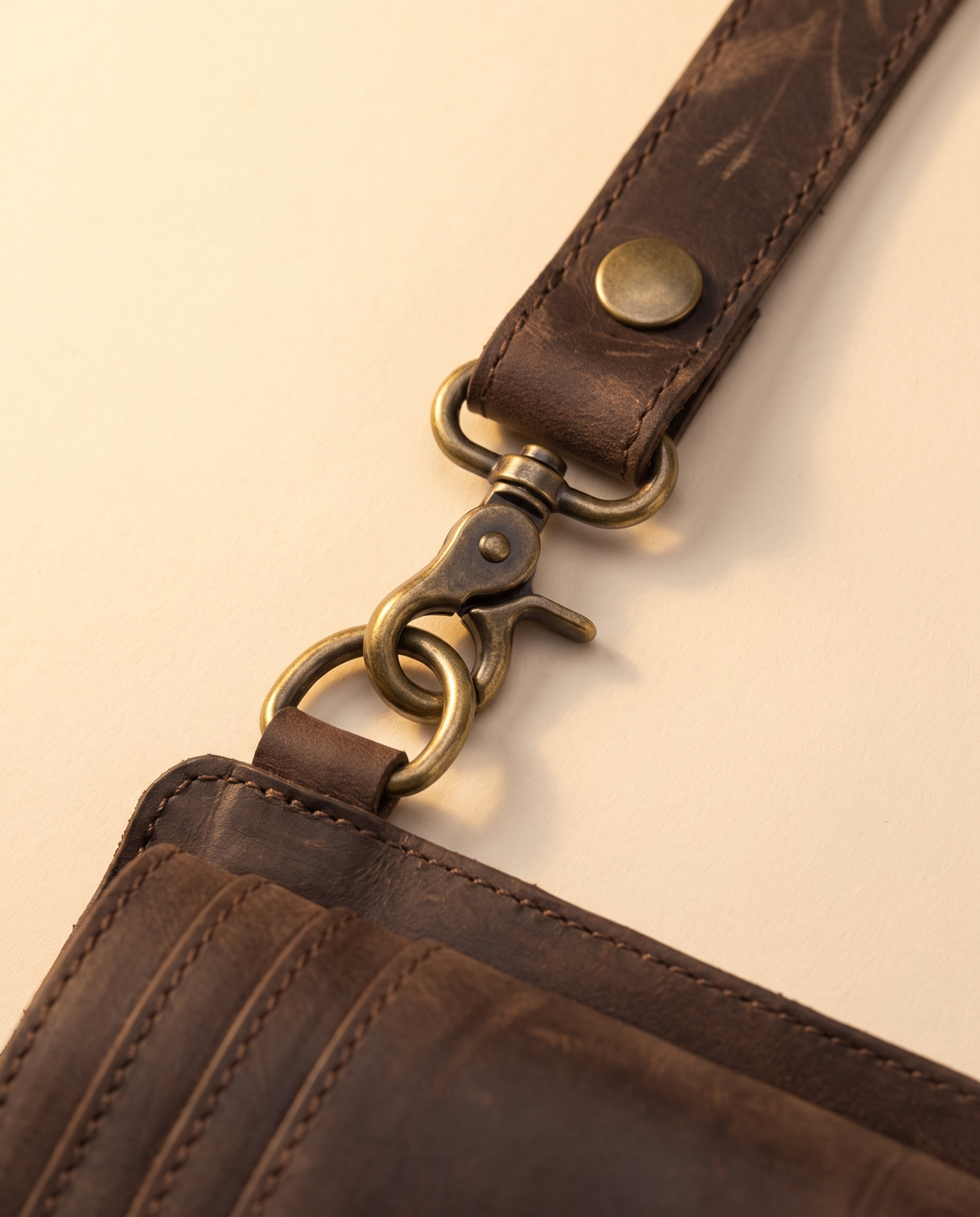 Dark brown leather harness bag with two detachable pouches, by Ya Qalbi