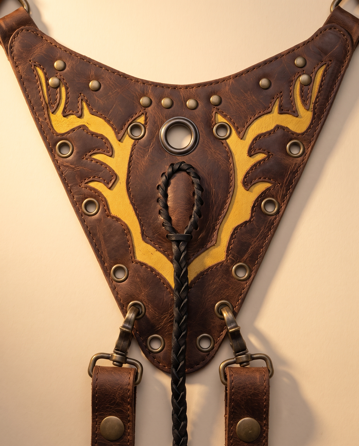 Dark brown and yellow hand-painted antler leather harness bag with gemstone, by Ya Qalbi