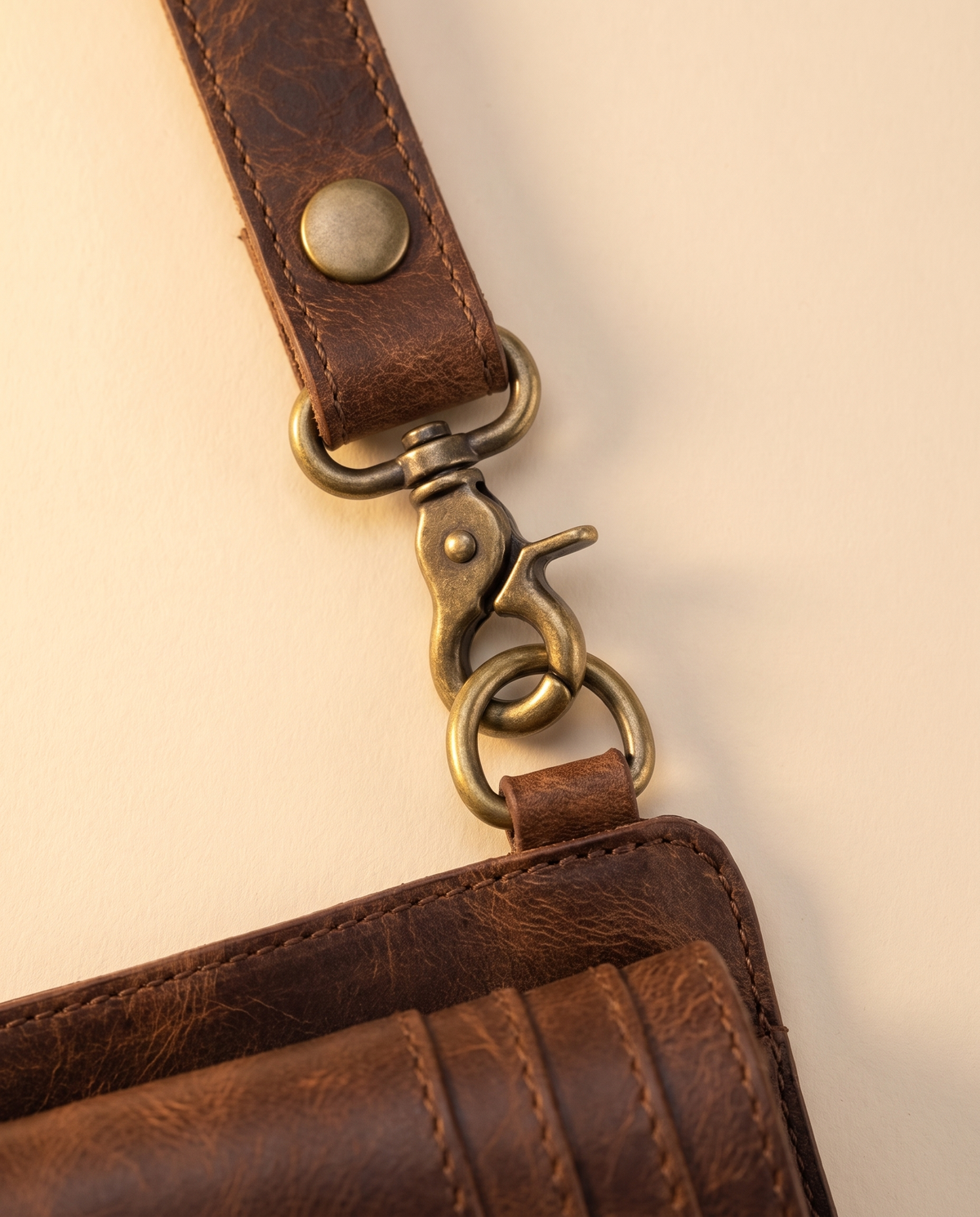 Dark brown and yellow hand-painted antler leather harness bag with gemstone, by Ya Qalbi