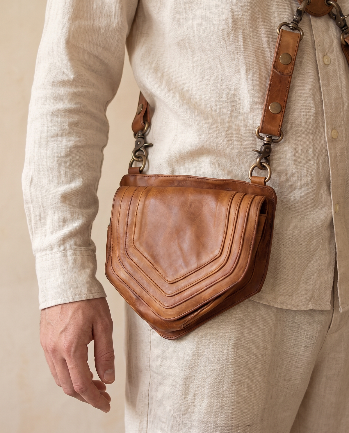Tan and black hand-painted antler leather harness bag with gemstone, by Ya Qalbi