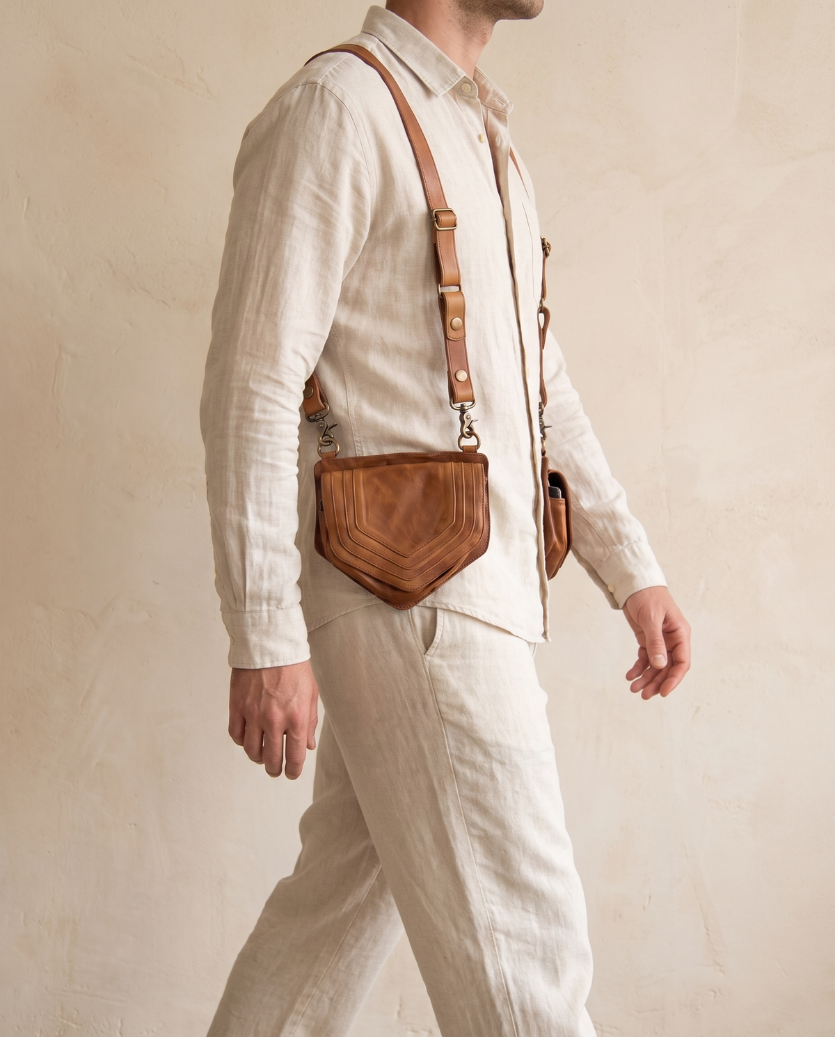 Tan and black hand-painted antler leather harness bag with gemstone, by Ya Qalbi
