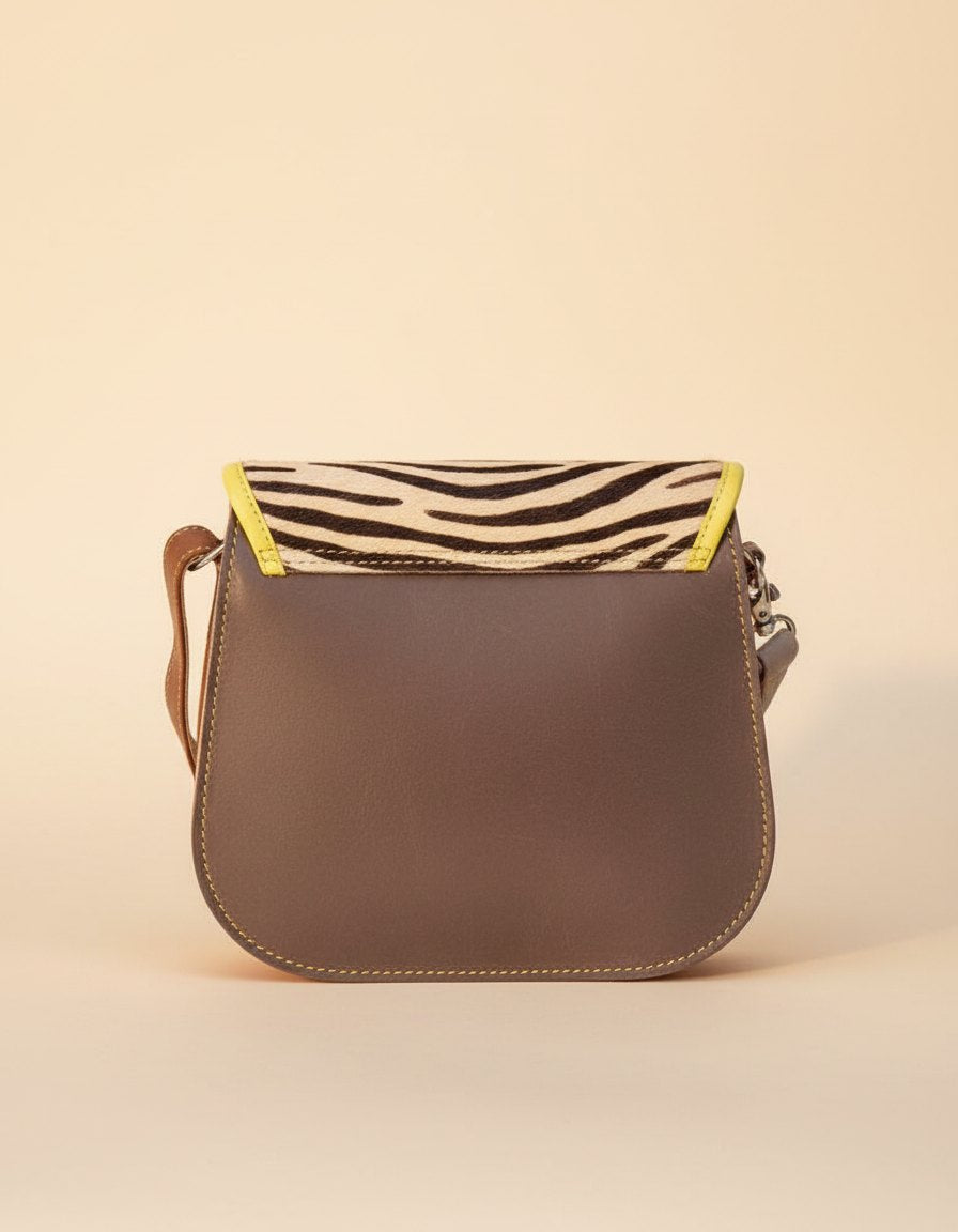 One-of-one hair-on flap saddle bag, zebra saddle blue buckle colourway (cowhide)