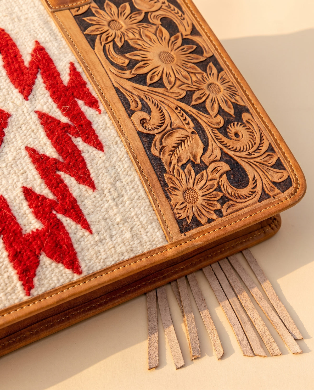Red Aztec weave hand-tooled leather tote with fringe, woven Aztec panel and floral tooling close-up, by Ya Qalbi