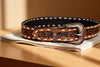 Full grain leather belt with hand carved floral and basketweave tooling