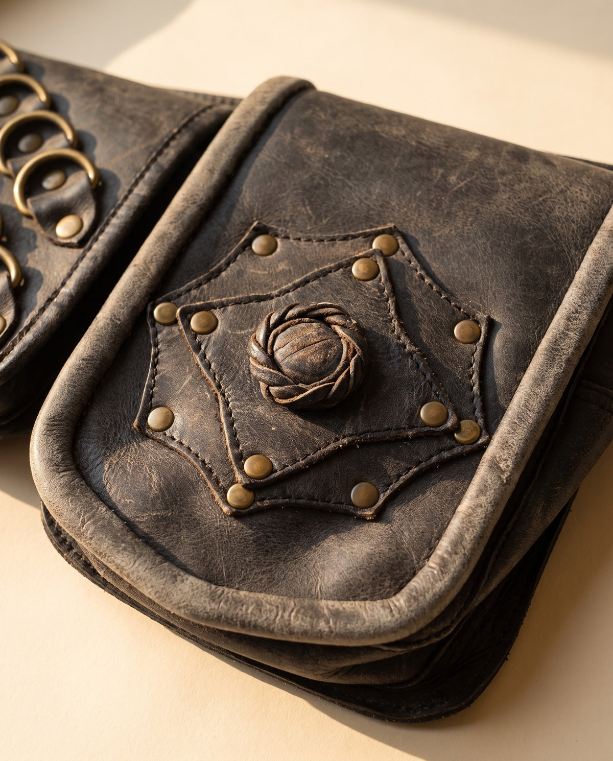 Black double pouch leather hip belt with rings and stone, detail close-up, by Ya Qalbi