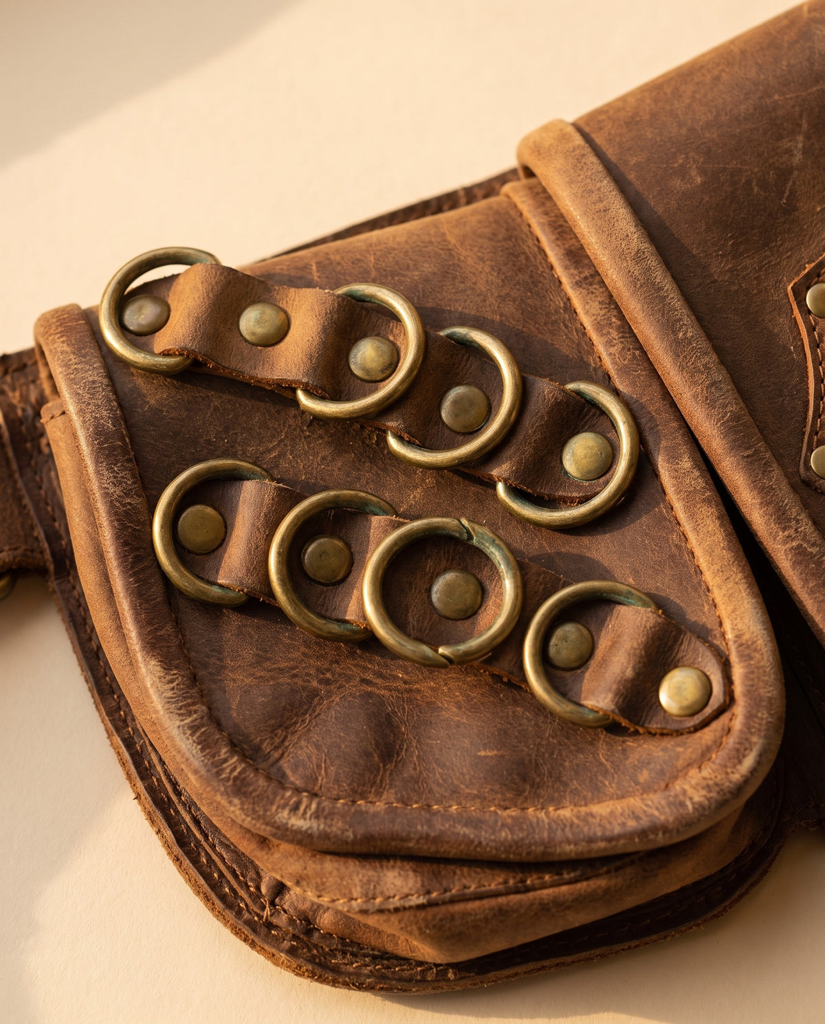 Brown double pouch leather hip belt with rings and stone, detail close-up, by Ya Qalbi