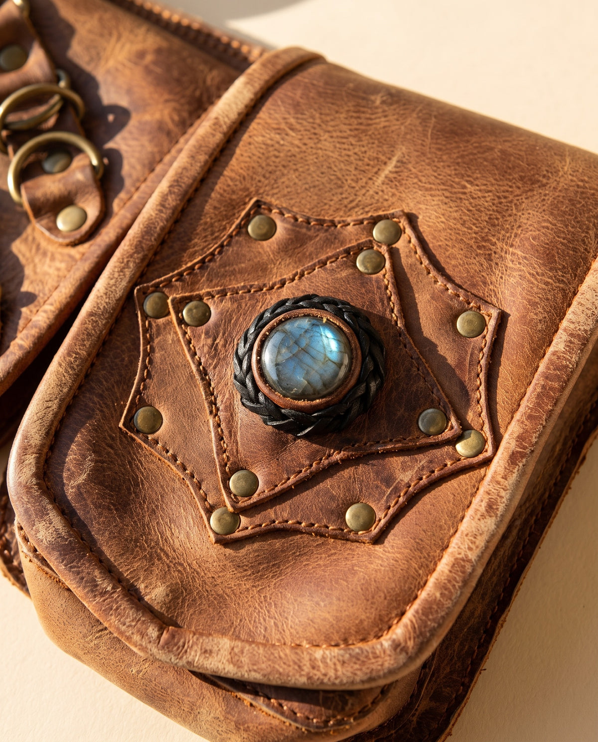 Tan double pouch leather hip belt with rings and stone, detail close-up, by Ya Qalbi