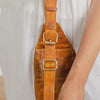 Genuine leather waist pouch with brass hardware by Ya Qalbi
