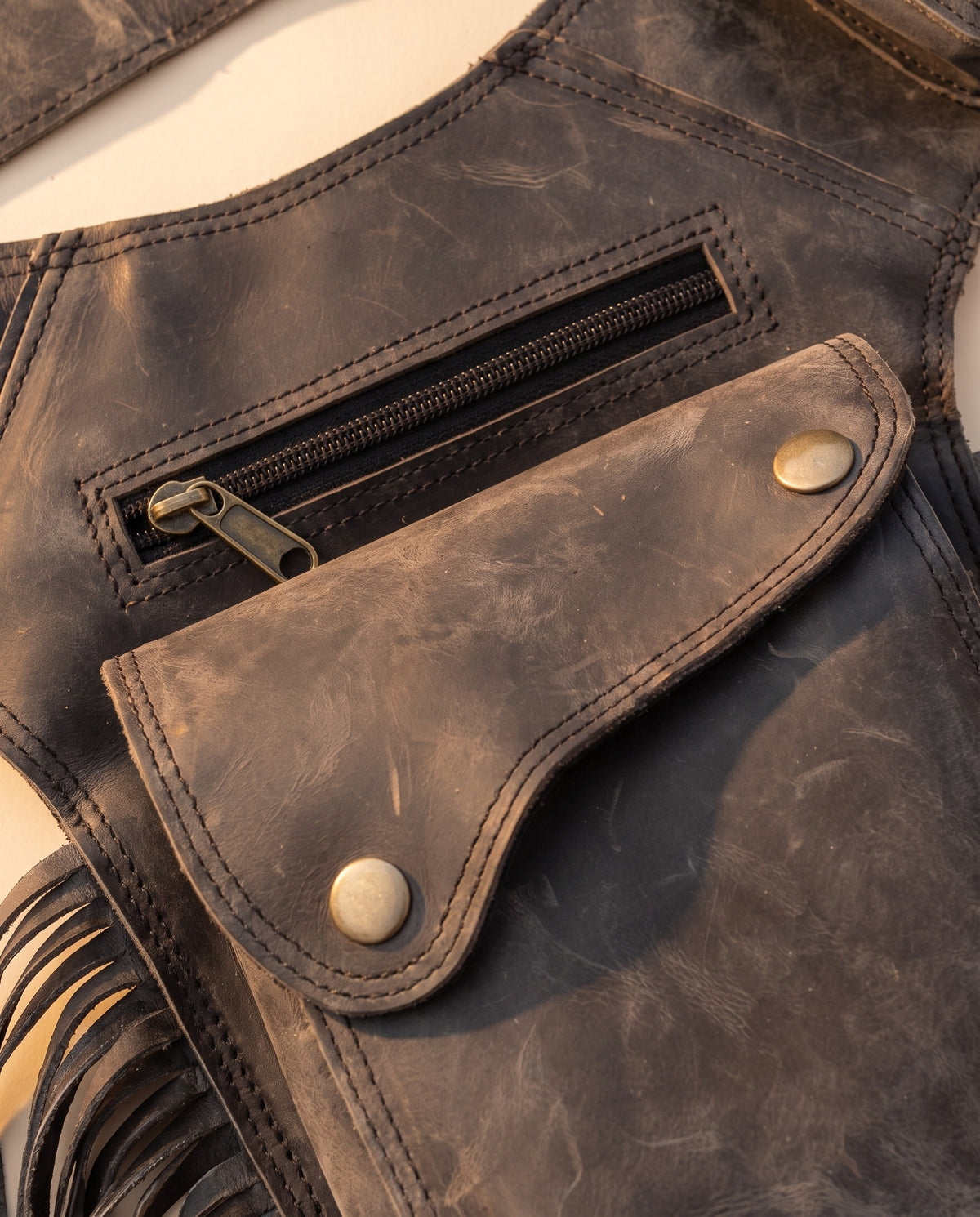 Charcoal fringe leather holster hip bag, detail close-up, by Ya Qalbi