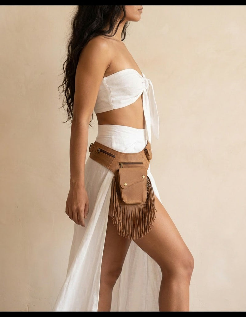 Tan fringe leather holster hip bag, worn by a model, by Ya Qalbi