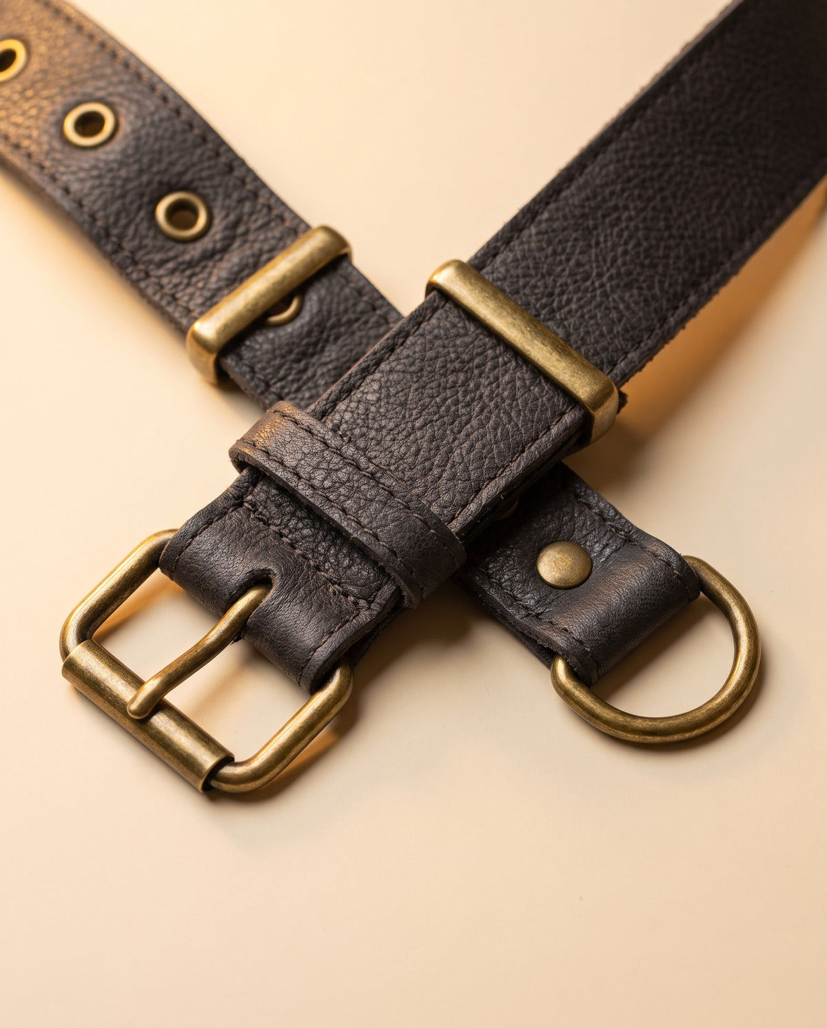 Black fringe leather hip bag with stone, detail close-up, by Ya Qalbi