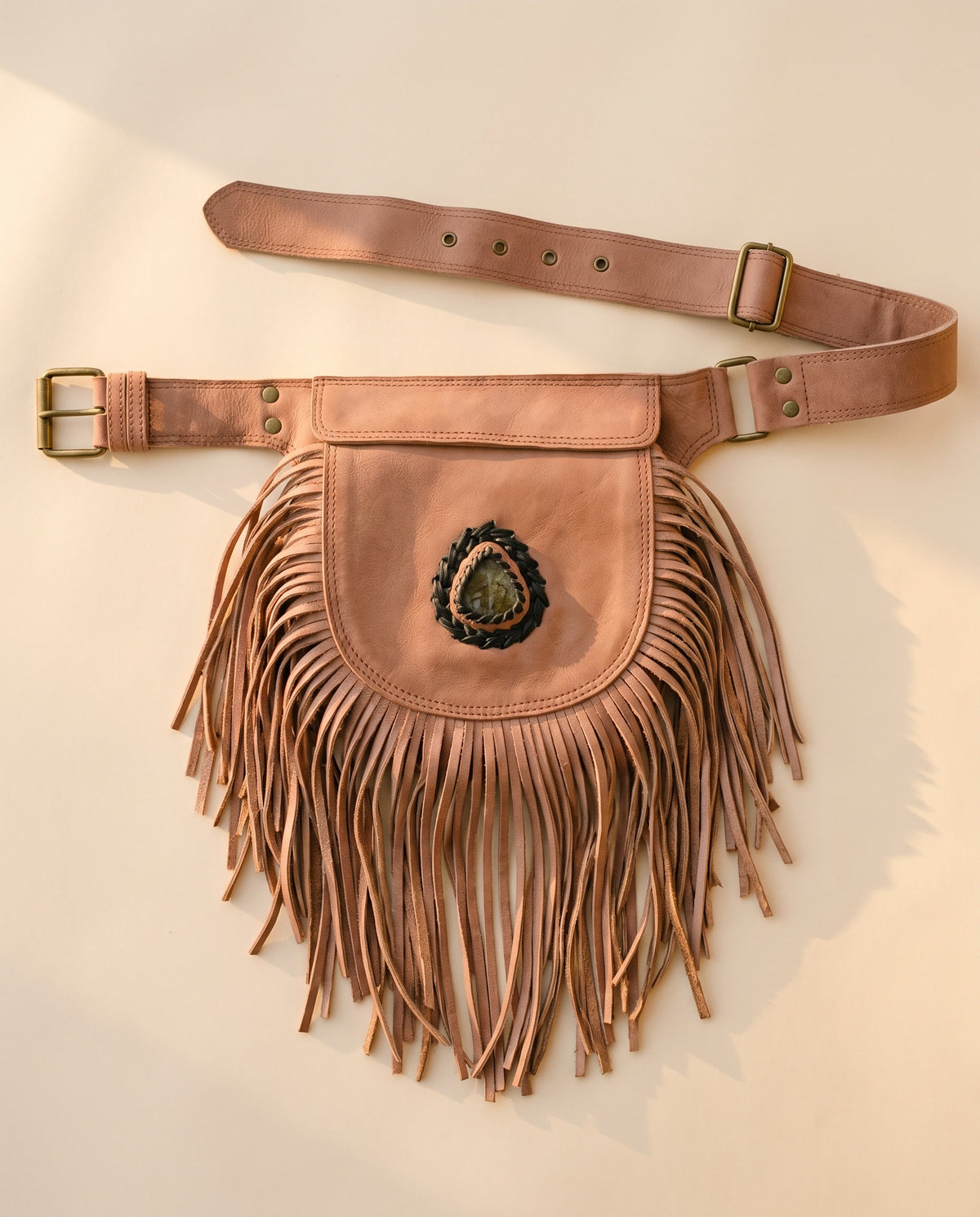Blush fringe leather hip bag with stone, front view, by Ya Qalbi