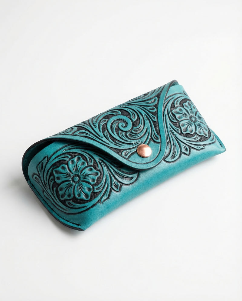 Hand-carved turquoise leather glasses case detail by Ya Qalbi