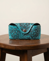 Turquoise hand-tooled leather sunglasses case with scroll floral carving by Ya Qalbi