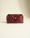 Red hand-tooled leather sunglasses case with Western floral carving by Ya Qalbi