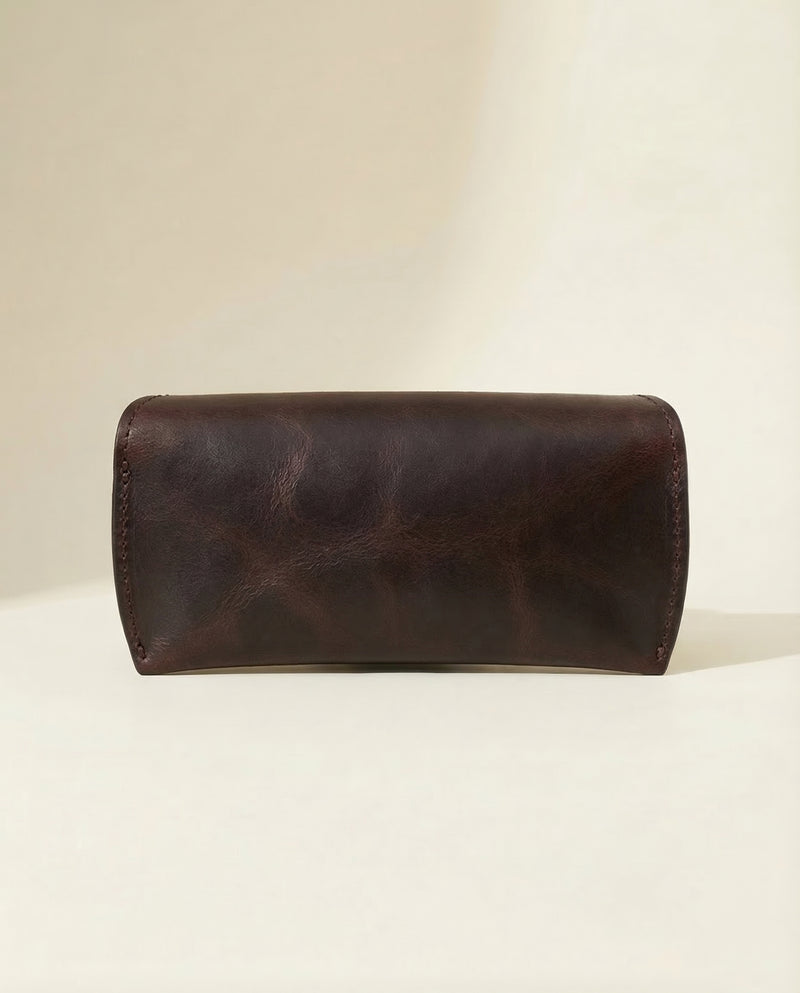 Full-grain dark brown leather eyeglass holder with silver snap by Ya Qalbi