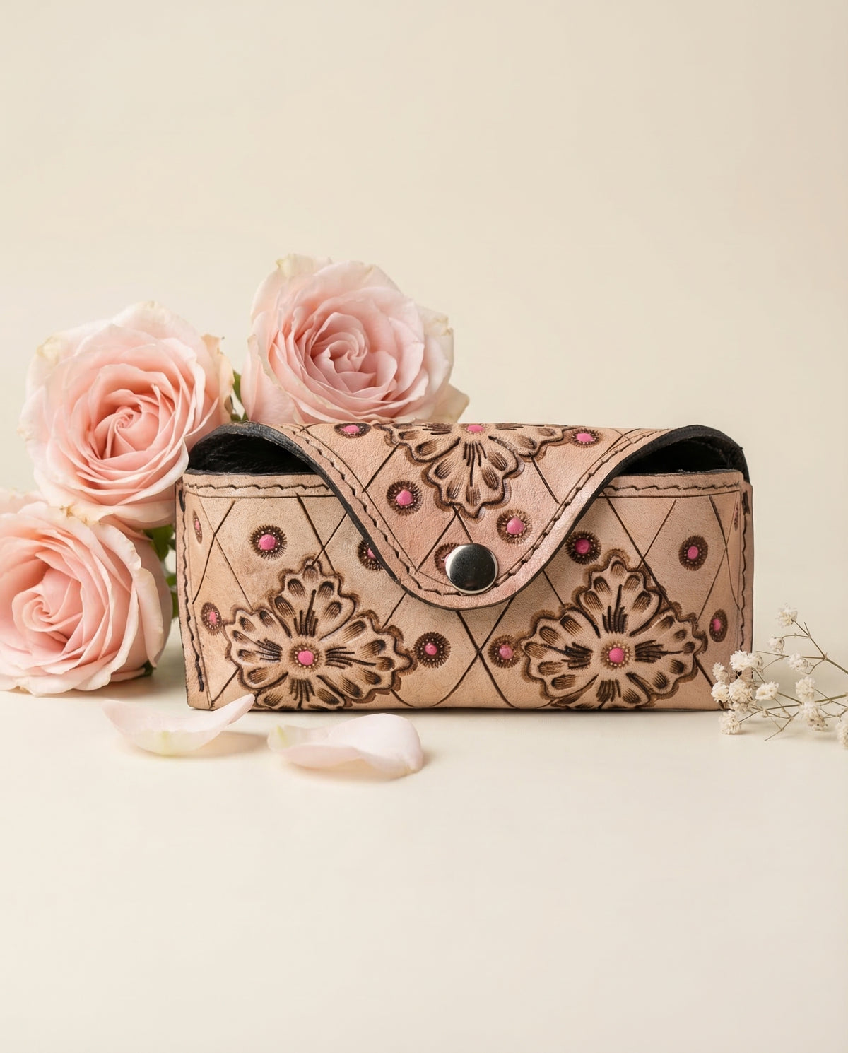 Beige hand-tooled leather sunglasses case with floral carved diamond pattern by Ya Qalbi