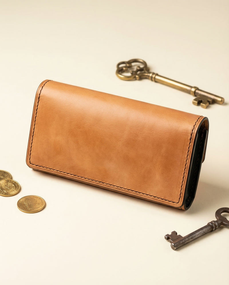 Full-grain honey gold leather eyeglass holder with silver snap by Ya Qalbi
