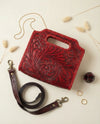 Red hand-carved leather handbag interior detail by Ya Qalbi