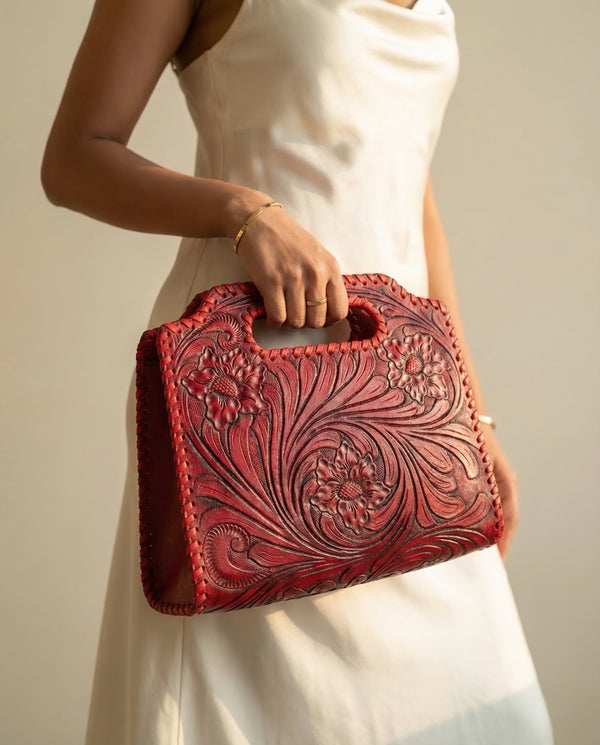 Red hand-tooled leather handbag with whipstitch Western floral carving by Ya Qalbi