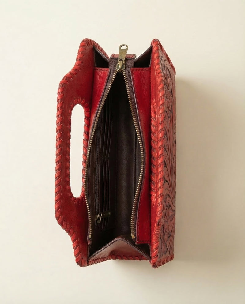 Deep red hand-tooled leather purse by Ya Qalbi