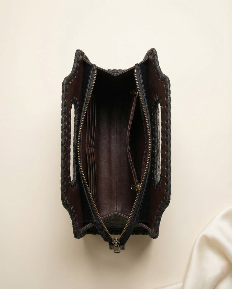 Premium black leather handbag with Western motif carving by Ya Qalbi