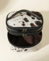 Hand-finished hair-on leather makeup case by Ya Qalbi