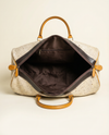 Cowgirlcore leather duffle bag side view by Ya Qalbi