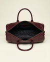Maroon crocodile leather weekender bag with brass studs by Ya Qalbi