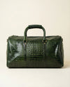 Deep green croc leather travel duffle by Ya Qalbi