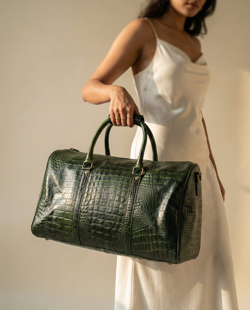 Green crocodile texture leather weekender bag by Ya Qalbi