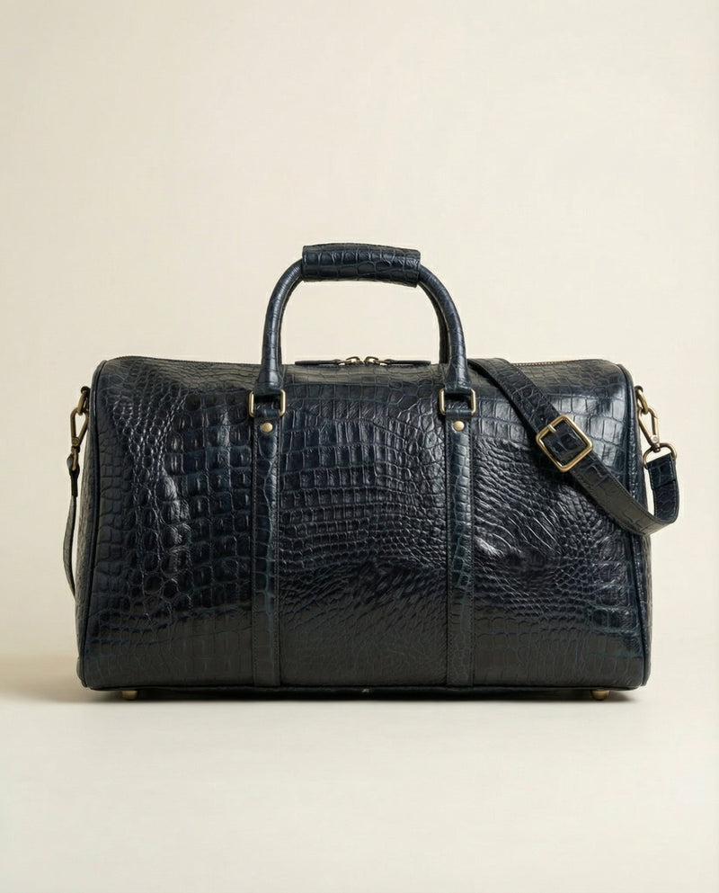 Full-grain blue croc leather travel duffle by Ya Qalbi