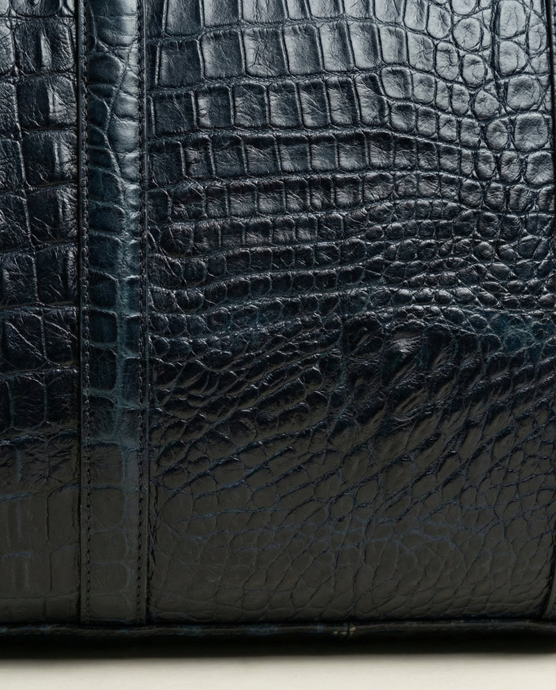 Designer blue leather weekender bag side view by Ya Qalbi