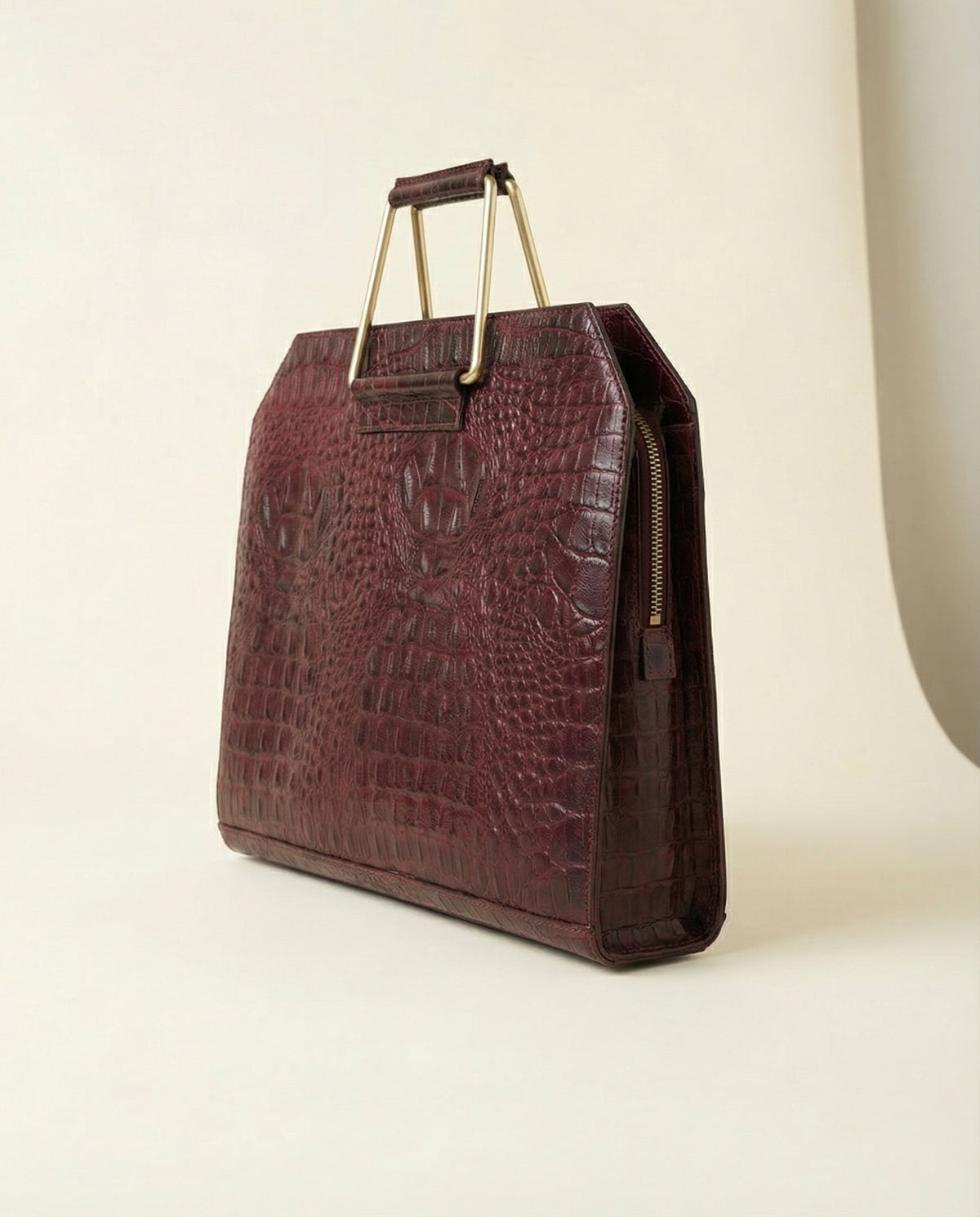 Wine croc leather laptop bag, side view