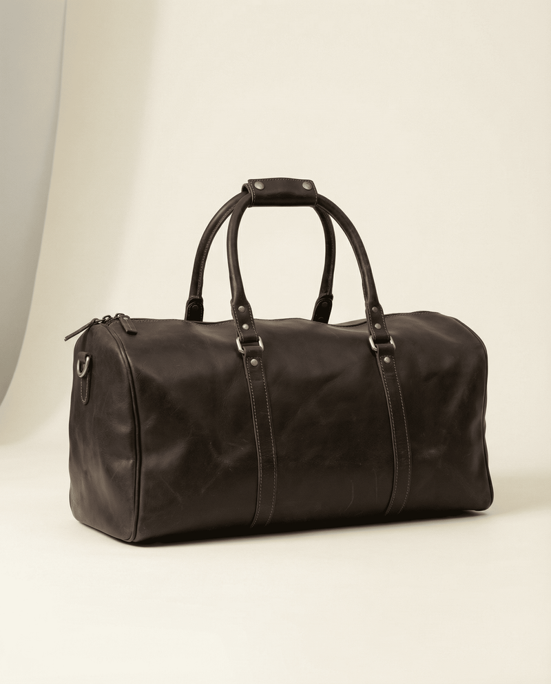 Men's leather overnight bag side view by Ya Qalbi