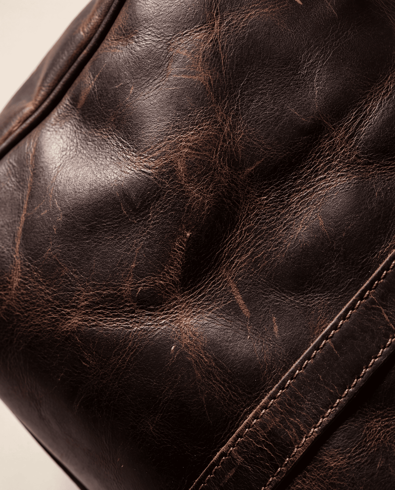 Premium men's leather travel duffle styled view by Ya Qalbi
