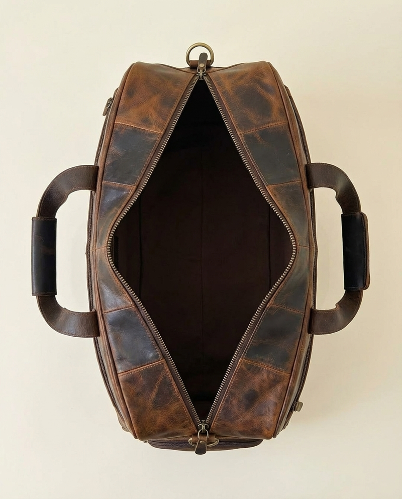 Genuine leather weekender bag with hand-stitched seams by Ya Qalbi