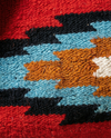 Vintage-inspired kilim and leather travel bag side view by Ya Qalbi