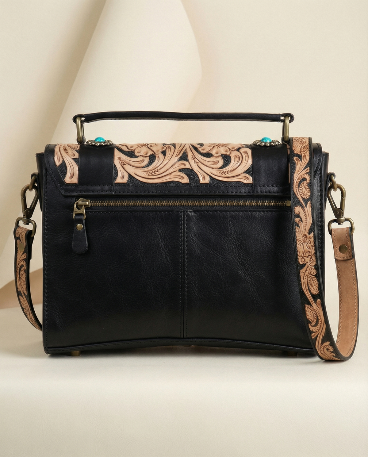 Back view of midnight black tooled satchel with zip pocket by Ya Qalbi