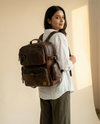 Brown leather laptop backpack side angle by Ya Qalbi