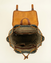 Sleek black leather work backpack interior by Ya Qalbi