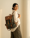 Black leather travel rucksack with smart pockets by Ya Qalbi